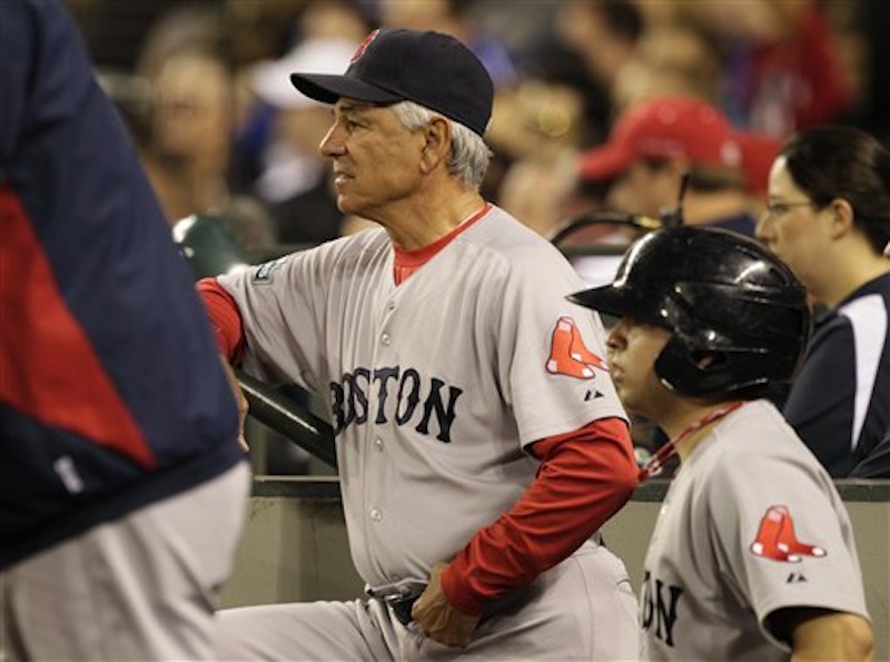 Boston Red Sox manager Bobby Valentine watches from the dugout late in a baseball game against the Seattle Mariners om Saturday, June 30, 2012, in Seattle. MLB Commissioner Bud Selig is critical of a new film that Valentine produced about baseball corruption in the Dominican Republic. (AP Photo/Ted S. Warren)