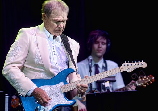 Glen Campbell performs with members of his family in Biloxi, Miss., last July.