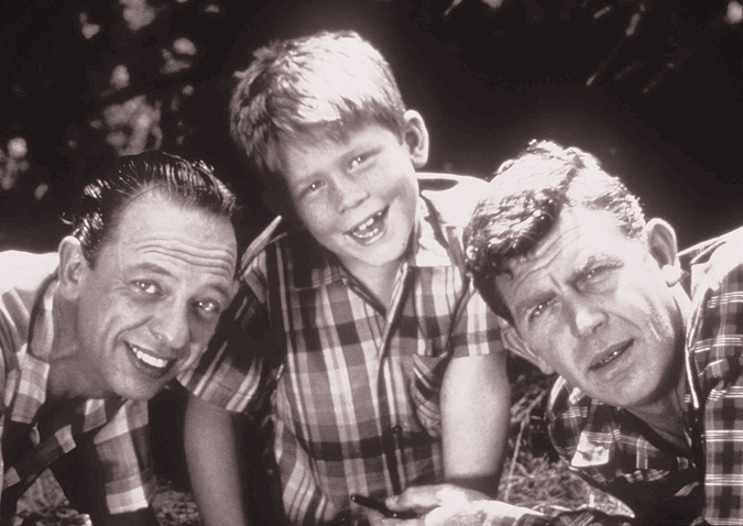 Cast members from "The Andy Griffith Show," from left: Don Knotts as Deputy Barney Fife, Ron Howard as Opie Taylor and Andy Griffith as Sheriff Andy Taylor.