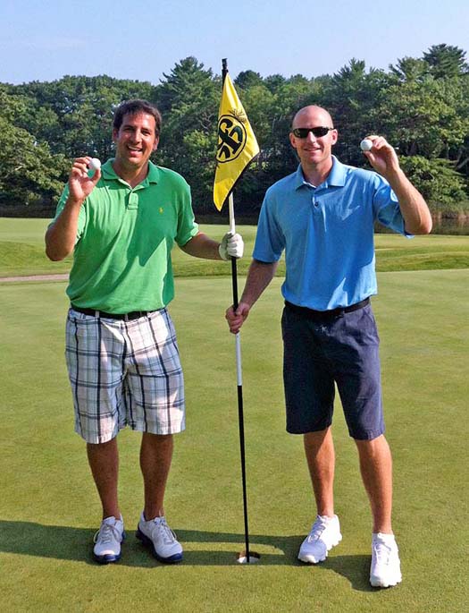 Matt Parker, left, of Falmouth and Travis Ferrante of Portland each made a hole-in-one Tuesday on the fourth hole at Portland Country Club. According to Golf Digest, the odds of two golfers in the same foursome accomplishing the feat are 17 million to 1.