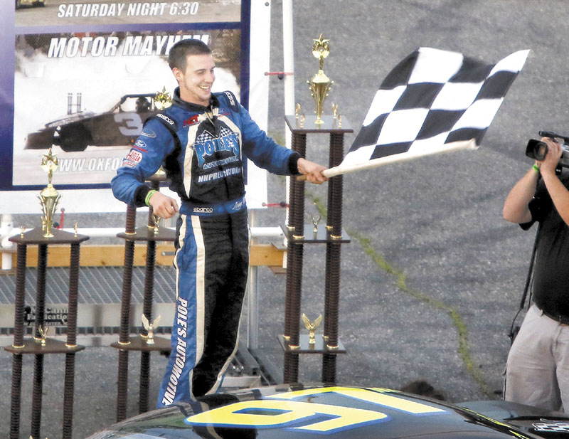 Joey Polewarczyk, Jr. celebrates after winning the TD Bank 250 on Sunday at Oxford Plains Speedway in Oxford.