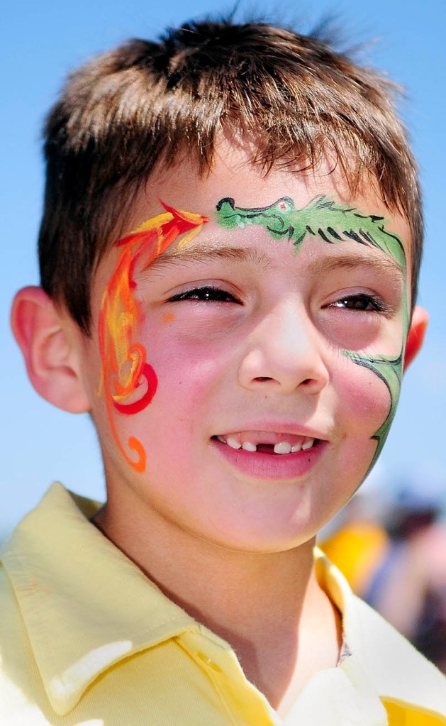 Dominick Dow sports a dragon tattoo in face paint at the Whatever Family Festival Kid’s Day events on Saturday afternoon.