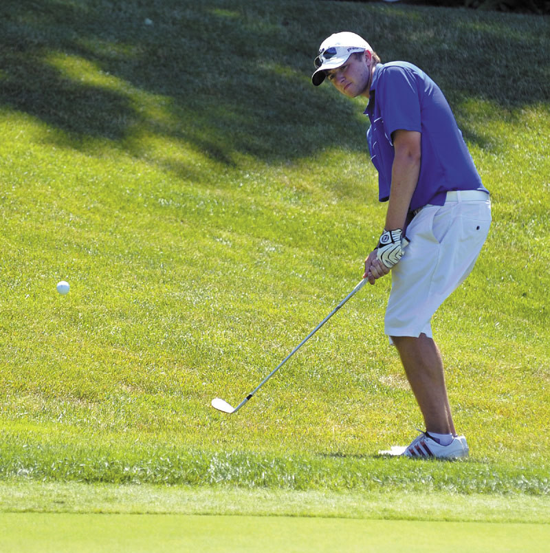 Photo by Gordon Chibroski / Staff Photographer. Thursday, July 12, 2012. 2012. Seth Sweet chips on the 17th and makes bogey after missing the putt in Maine Amateur Golf action at Sunday River Golf Club in Newry, Maine.