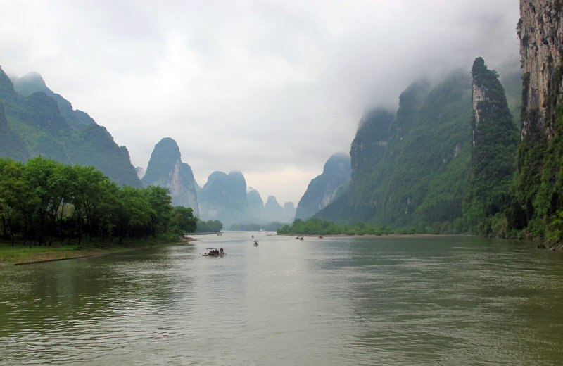 A four-hour cruise down the Li River from Guilin, China, to the picturesque city of Yangshuo, offers views of the limestone karst hills known as the gumdrop mountains.