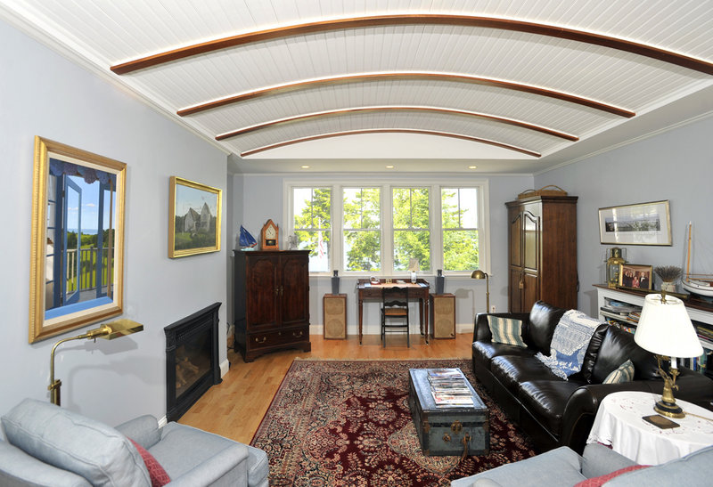 The upstairs sitting room, with its curved bead board ceiling.