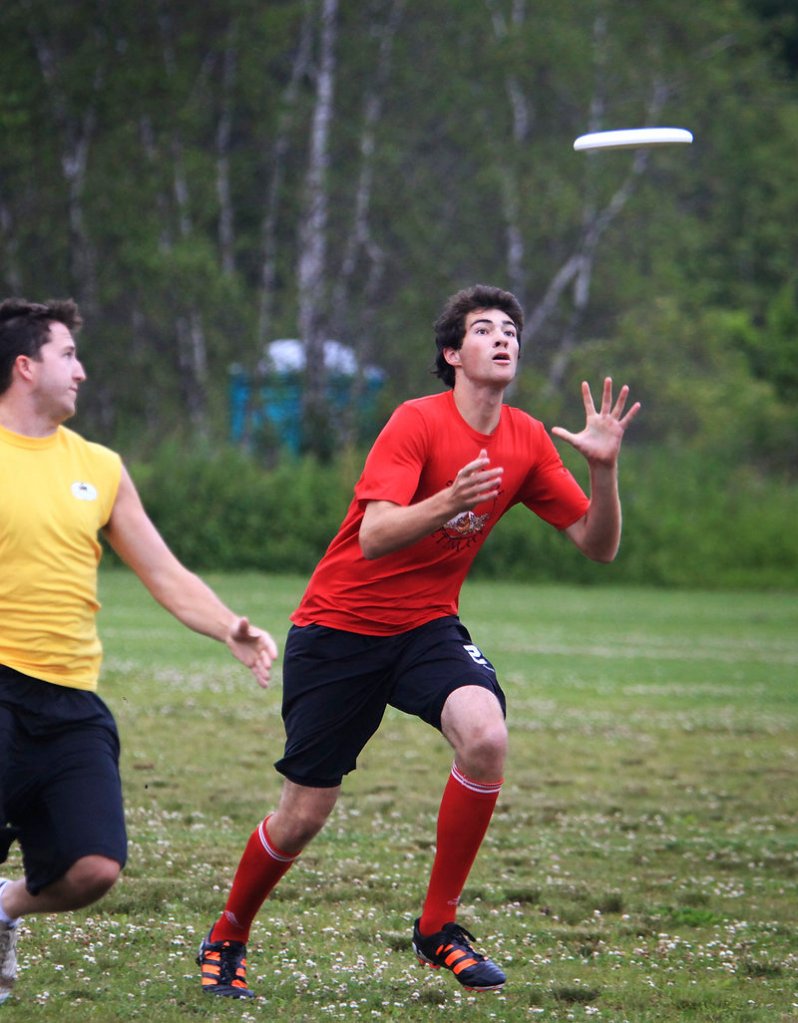Thomas Robinson of Cape Elizabeth goes for the catch for the Rising Tide, who are preparing for a national ultimate Frisbee youth tournament.