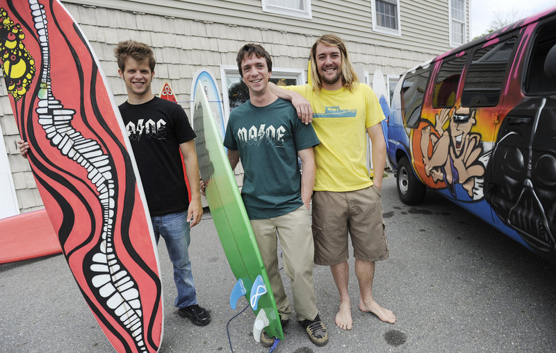 Brett Dobrovolny, 23, Ryan McDermott, 25, and Andy McDermott, 28, are the team behind Black Point Surf Shop.