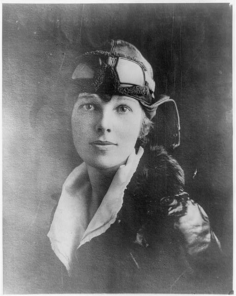 Amelia Earhart wears a leather helmet with goggles and a fur-collared leather coat in this undated photograph.