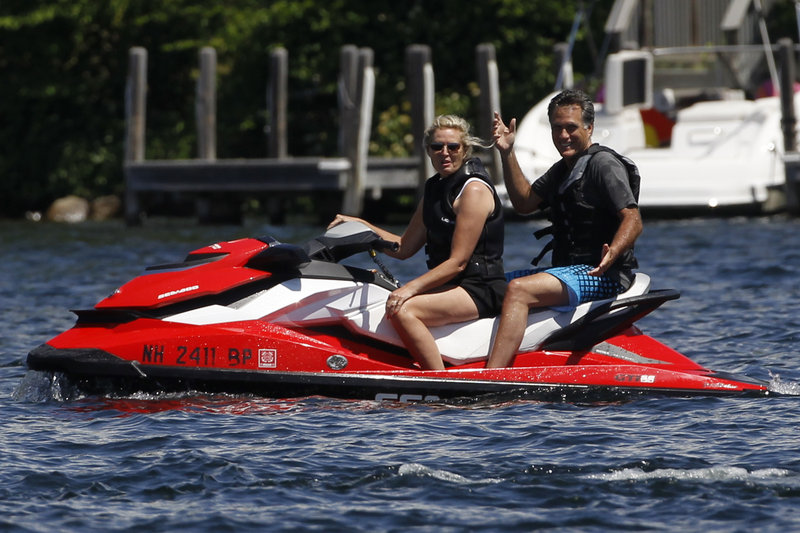 Presidential candidate Mitt Romney and his wife, Ann, take a ride on Lake Winnipesaukee in Wolfeboro, N.H., on Monday.