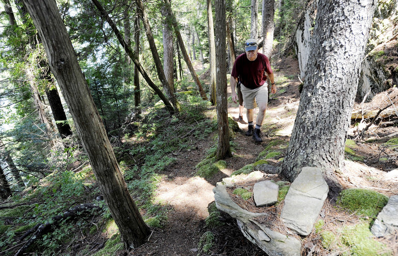 Don Miskill, a volunteer with the Harpswell Recreation Department and its former director, hikes the Devil’s Back Trail on Orrs Island, which presents magnificent ocean views.