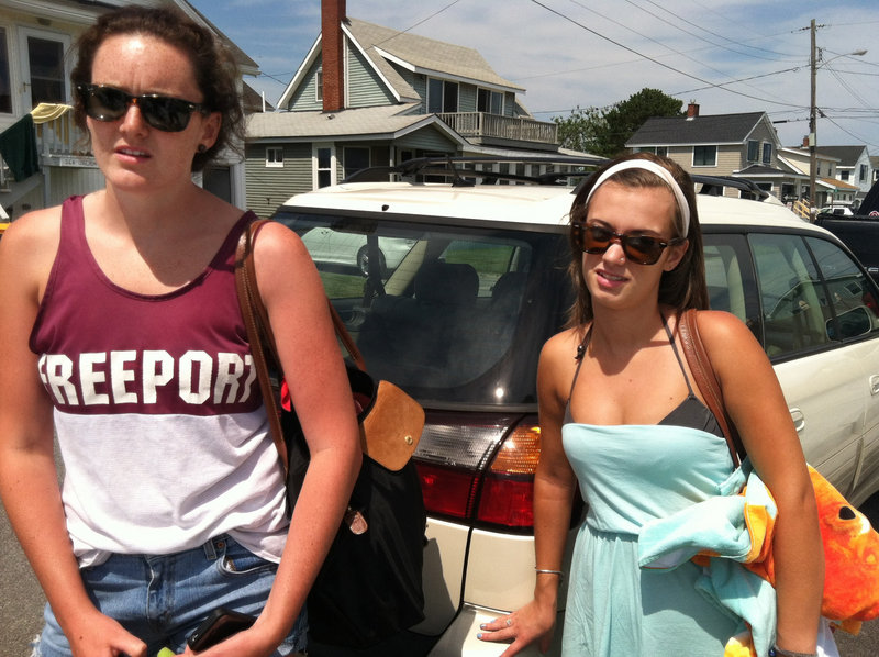 Alice Gormley, 19, left, and Cara Yost, 19, of Freeport, say the won’t come to Higgins Beach if they have to pay a $65 annual parking pass. “It’s ridiculous,” Gormley said. “I’m a college student and I’m kind of broke, and I won’t be able to afford it.”