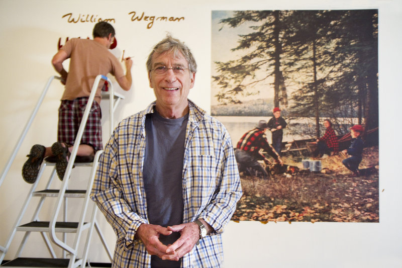 William Wegman during the installation of “Hello Nature," the exhibition at Bowdoin College of more than 100 paintings, photographs, drawings and videos that Wegman has created over the past 30 years.