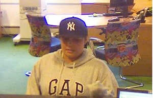 Bank robbery suspect shown in surveillance video.