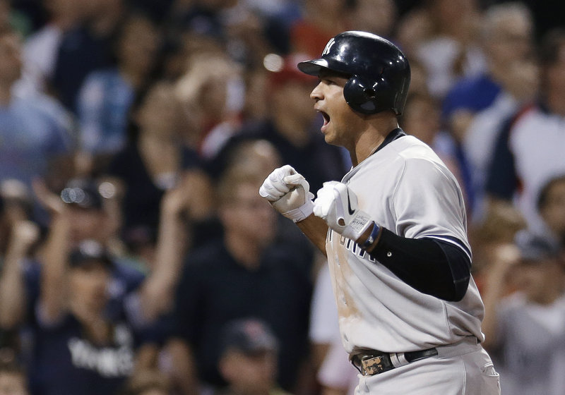 Alex Rodriguez of the Yankees displays his emotion after scoring on Mark Teixeira’s triple in the seventh inning that gave New York the lead for good.