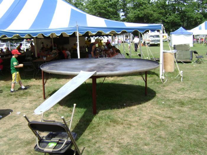 The festival’s giant frying pan, made in 1973, is 10 feet in diameter and weighs 300 pounds.
