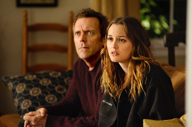 Hugh Laurie and Leighton Meester in “The Oranges.”