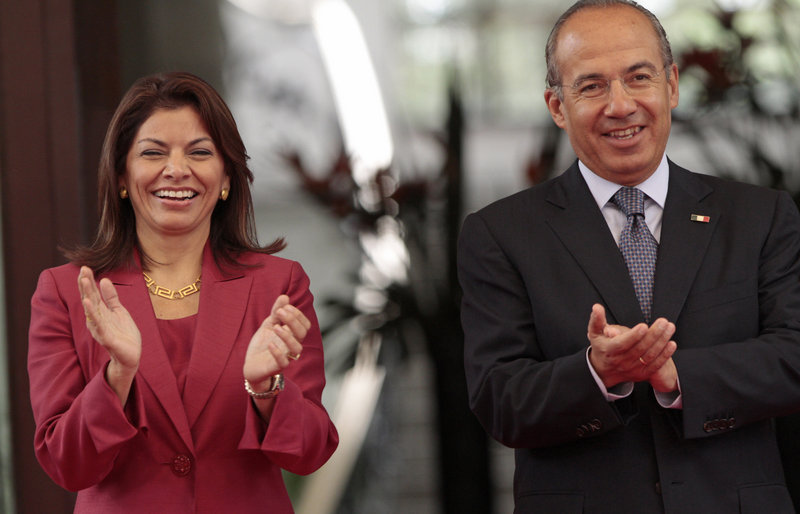 Costa Rica’s President Laura Chinchilla, shown with Mexico's President Felipe Calderon, took the description lightly, saying, “we Costa Ricans have a strong spirit of self-criticism.”