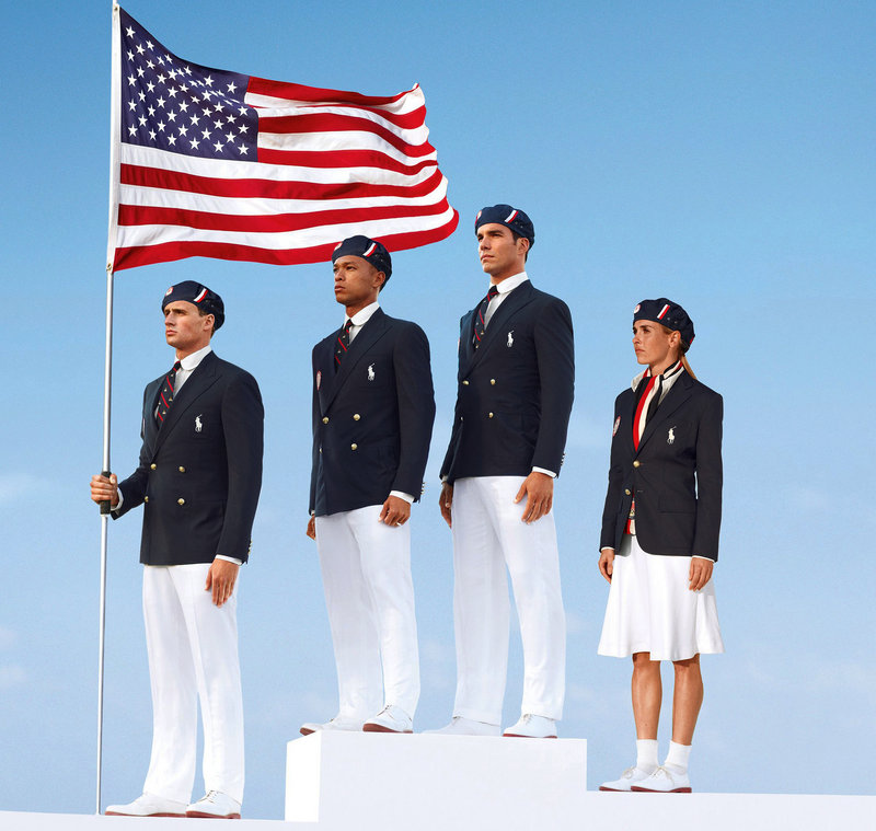 This product image released by Ralph Lauren shows U.S. Olympic athletes, from left, swimmer Ryan Lochte, decathlete Bryan Clay, rower Giuseppe Lanzone and soccer player Heather Mitts modeling the the official Team USA opening ceremony parade uniform, which was made in China.