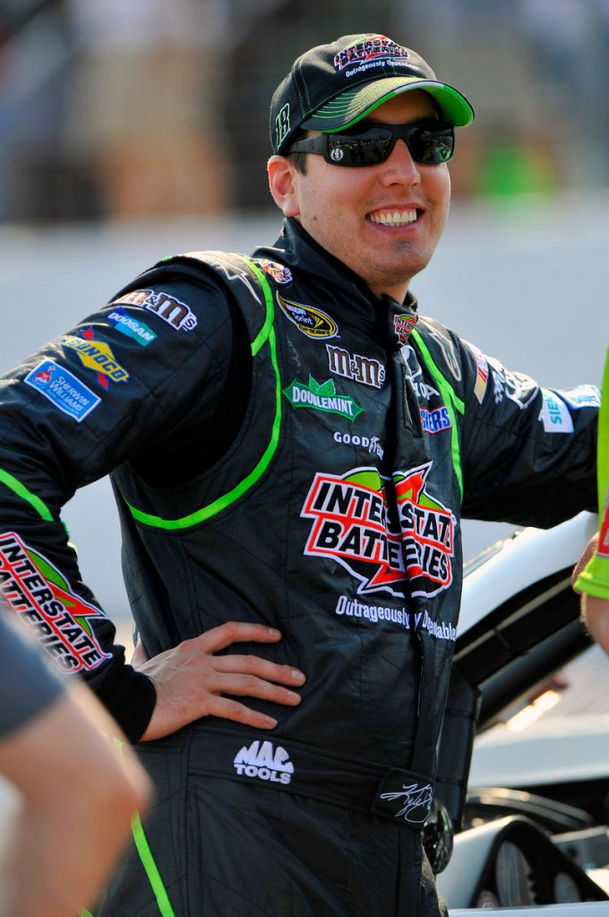 Kyle Busch was all smiles Friday as he won the pole for Sunday’s Sprint Cup race at New Hampshire Motor Speedway.