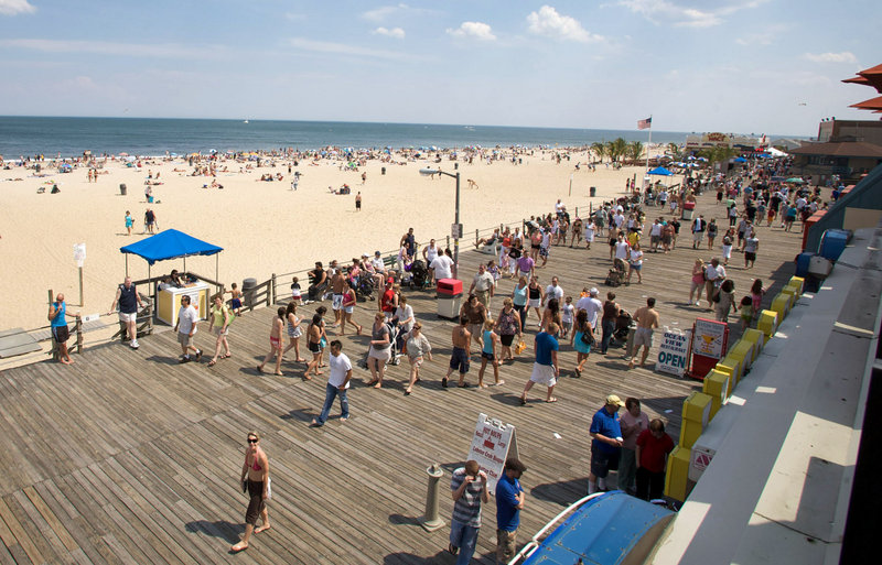 The boardwalk in Point Pleasant Beach, N.J., is one attraction that draws as many as 50,000 tourists a day to the town in the summer. Residents are pushing for earlier bar closings.