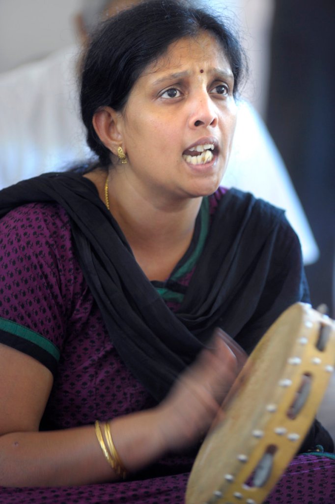 Sreevally Challapalli of Scarborough sings at the new Maine Hindu Temple.