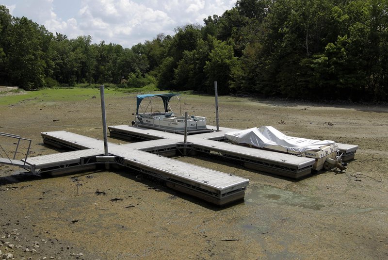 Boats sit on the bottom of a dry cove at Morse Reservoir in Noblesville, Ind., Monday. More than half the continental U.S. is now in some stage of drought.