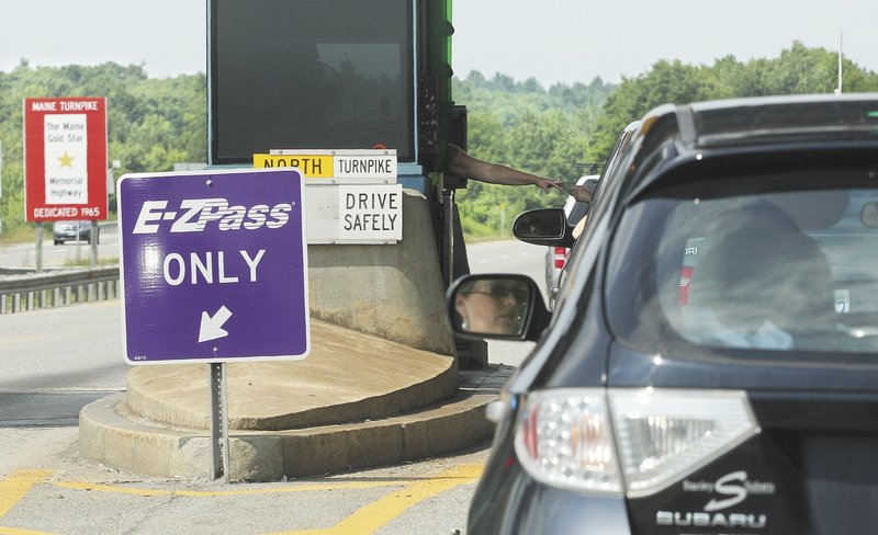 Motorists on I-295 northbund pass through the Gardiner toll booths Monday. Turnpike tolls are expected to increase starting in November to raise up to $26.5 million a year.