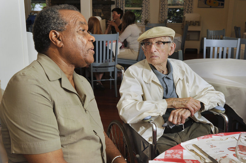 Artists David Driskell, left, and Will Barnet chat before dinner at the Rock Garden Inn in Georgetown recently.