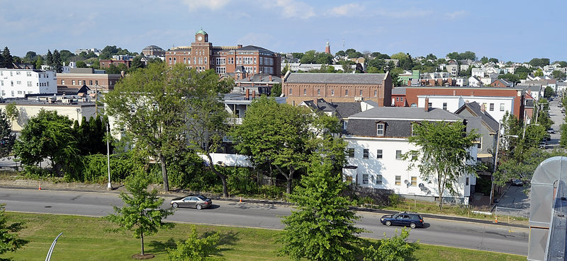 The block bordered by Newbury, Hampshire, Federal and Franklin streets, as seen from the top of the Courthouse parking garage, is planned for development.