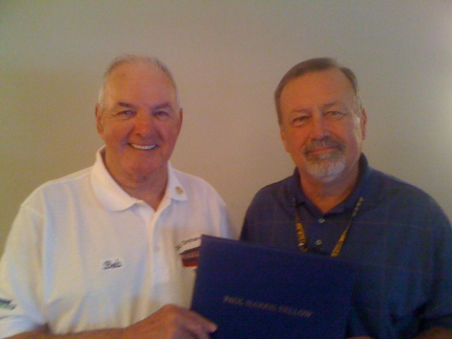 Bob Moody, left, of Saco accepts the Rotary Club of Saco Bay’s Paul Harris Fellow award from John Bouchard.
