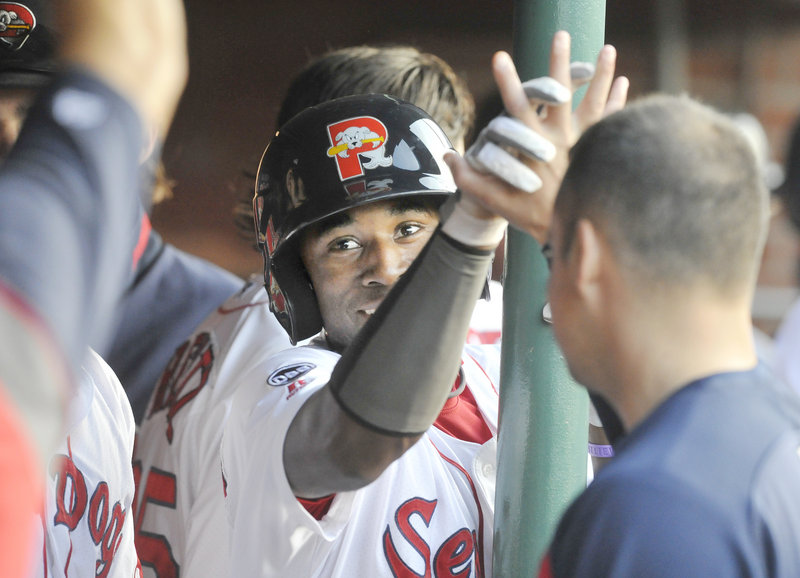 Jackie Bradley Jr. of the Sea Dogs is greeted in the dugout after hitting a first-inning homer Monday night against Trenton at Hadlock Field. It was Bradley’s third homer of the season for Portland, which has won 10 of 13.