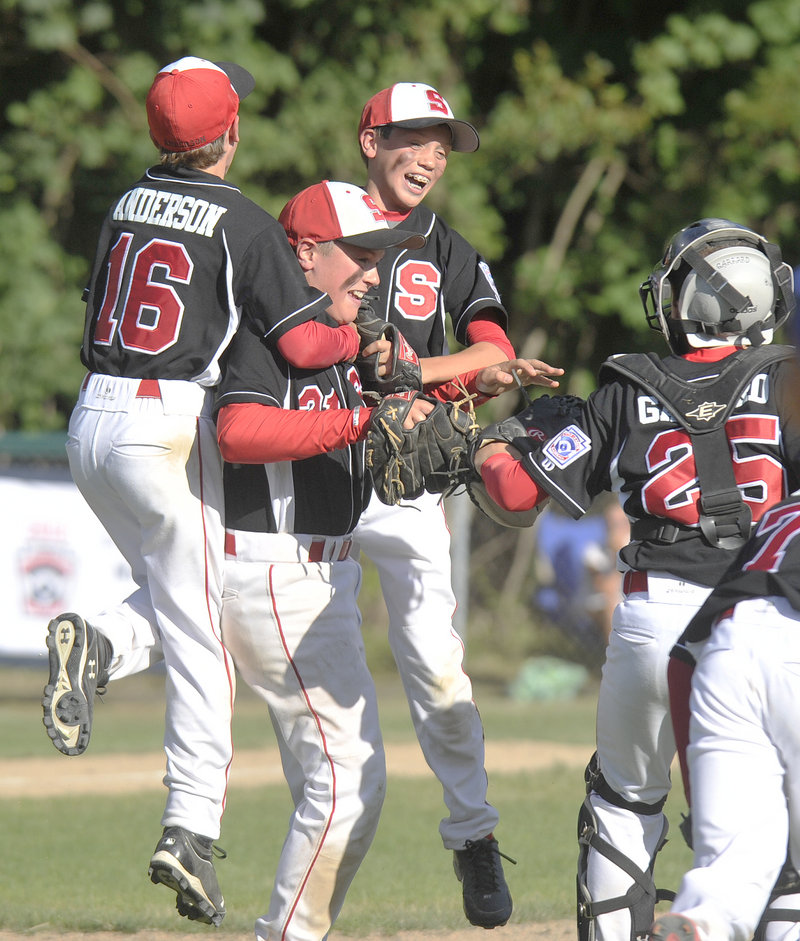 These Scarborough 12-year-old baseball players know how to celebrate, and they were doing it again Wednesday, mobbing pitcher Jared Brooks after beating Dirigo 12-1 to win the Little League state title.