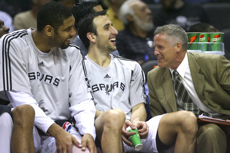 Brett Brown, as an assistant coach and executive, has been a part of four NBA titles with the San Antonio Spurs, with Tim Duncan, left, and Manu Ginobili.