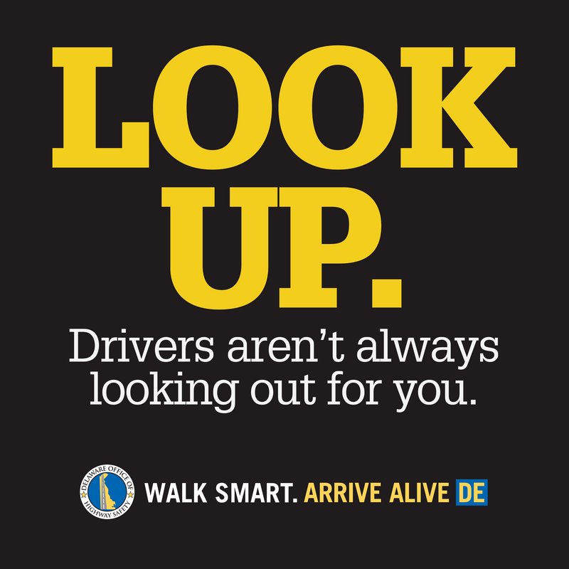 Highway safety officials in Delaware place this 2-foot-square decal on crosswalks and sidewalks to remind pedestrians to change focus.
