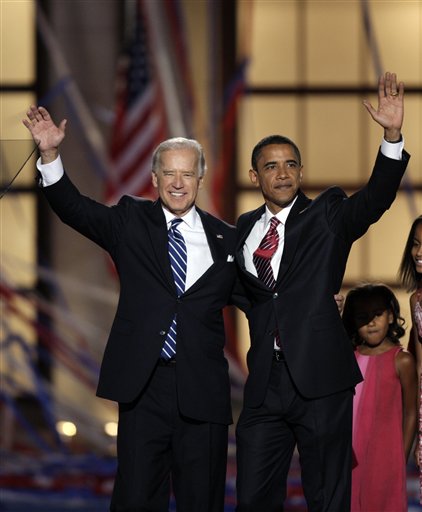 ADVANCE FOR SUNDAY, AUG. 19 AND THEREAFTER - FILE - In this Aug. 28, 2008, file photo, Democratic presidential nominee, then-Sen. Barack Obama, D-Ill., and his running mate, then-Sen. Joe Biden, D-Del., wave after Obama's acceptance speech at the Democratic National Convention in Denver. Nearly four years after Barack Obama was elected to the most powerful office in the most powerful country in the world, the question remains: Who is he? This is a man who seemed to come out of nowhere. He had served seven years in the Illinois state Senate, and less than four years in the U.S. Senate _ a meager political resume, augmented by a stirring speech at the 2004 Democratic National Convention. (AP Photo/Ron Edmonds, File)