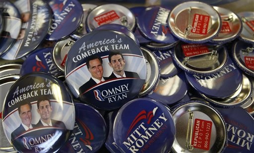 Republican presidential candidate and former Massachusetts Gov. Mitt Romney along with his running mate Republican vice presidential candidate, Rep. Paul Ryan, R-Wis., campaign buttons are displayed ahead of the Republican National Convention in Tampa, Fla., on Sunday, Aug. 26, 2012. (AP Photo/Jae C. Hong)
