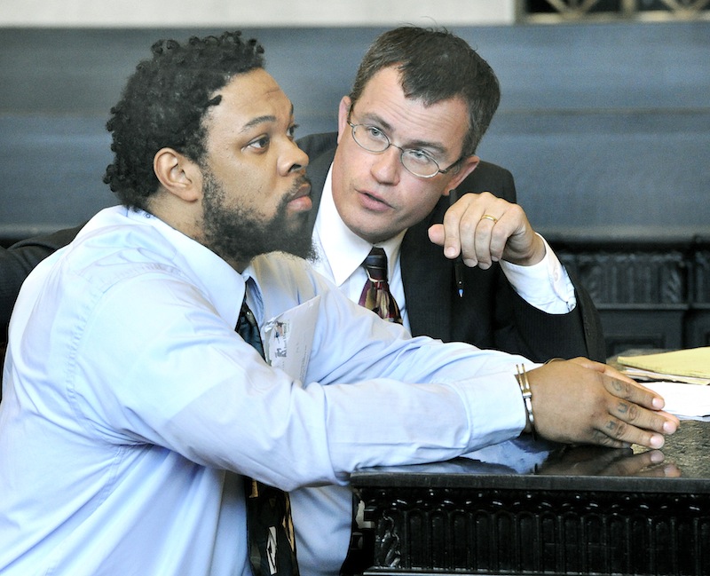 Tareek Hendricks listens to court appointed attorney Randall Bates on Wednesday, Aug. 8, 2012 before being denied bail for the 2011 stabbing death of Robert Stubbs of Westbrook.