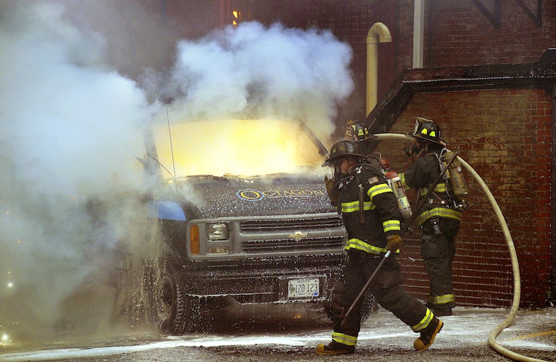 Firefighters responded to a van on fire in a parking lot off Exchange Street on Friday, August 17, 2012.