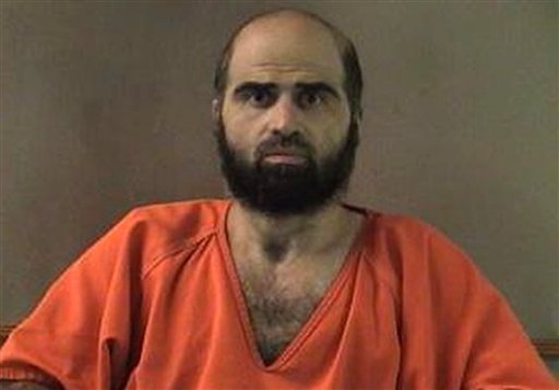 FILE - This undated file photo provided by the Bell County Sheriff's Department via The Temple Daily Telegram shows Nidal Hasan. The trial for the Army psychiatrist charged in the deadly 2009 Fort Hood shooting was put on hold Wednesday, Aug. 15, 2012, while an appeals court considers his objections to being forcibly shaved. (AP Photo/Bell County Sheriff's Department via The Temple Daily Telegram, File)