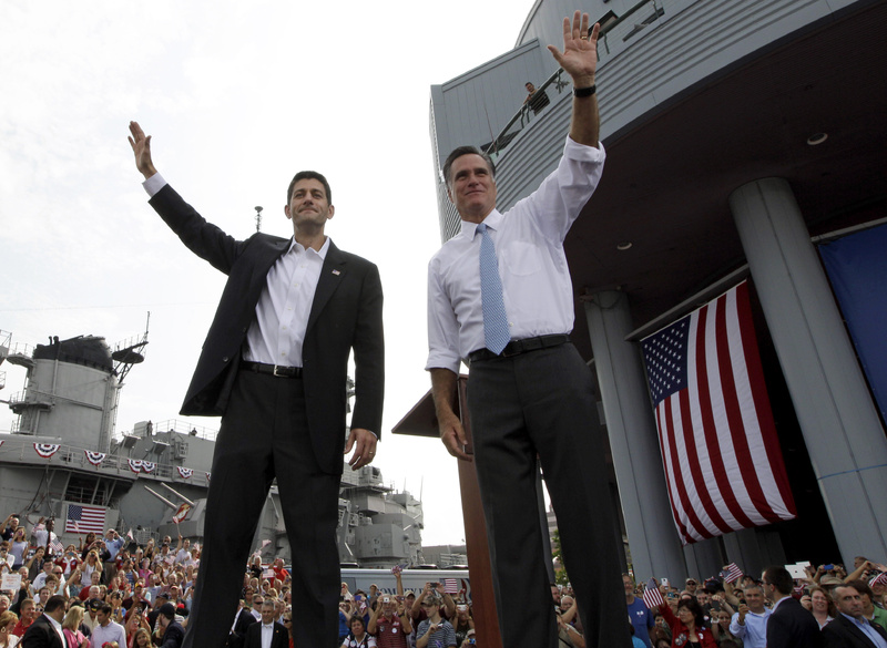 Republican presidential candidate Mitt Romney, right, and vice presidential candidate Wisconsin Rep. Paul Ryan, R-Wis., wave at the crowd during a campaign event Saturday in Norfolk, Va., where Romney introduced Ryan as his running mate.