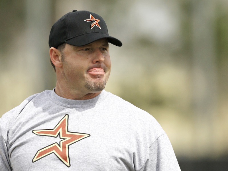 This Feb. 27, 2008 file photo shows Roger Clemens pausing while throwing batting practice during a workout at the Houston Astros minor league spring training facility in Kissimmee, Fla. Rogers Clemens has signed with the Sugar Land Skeeters of the independent Atlantic League and is expected to start for them on Saturday at home against Bridgeport. (AP Photo/David J. Phillip, File)