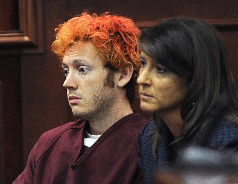 In this Monday, July 23, 2012 file photo, James Holmes, accused of killing 12 people in Friday's shooting rampage in an Aurora, Colo., movie theater, appears in Arapahoe County District Court with defense attorney Tamara Brady in Centennial, Colo. A court hearing Thursday, Aug. 30, 2012 will examine Holmes' relationship with a University of Colorado psychiatrist to whom he mailed a package containing a notebook that reportedly contains violent descriptions of an attack. His attorneys say Holmes is mentally ill and that he sought help from psychiatrist Lynne Fenton at the school, where he was a Ph.D. student, until shortly before the July 20 shooting. Prosecutors allege Holmes may have been angry at the failure of a once promising academic career. (AP Photo/Denver Post, RJ Sangosti, Pool, File)