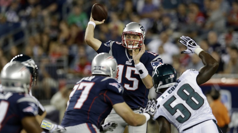 New England Patriots quarterback Ryan Mallett (15) throws as he is pressured by Philadelphia Eagles defensive end Trent Cole (58) during the first quarter of an NFL preseason football game in Foxborough, Mass., Monday, Aug. 20, 2012. (AP Photo/Elise Amendola)