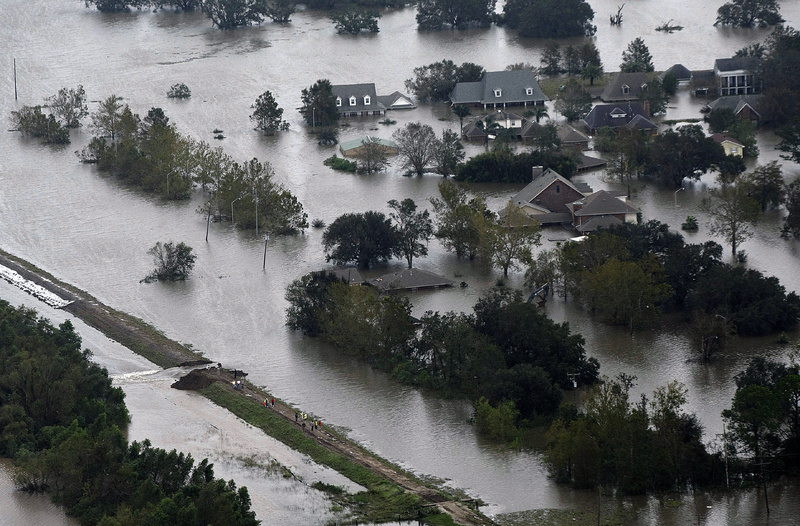 Aerial photo shows an intentional levy breach created to alleviate trapped floodwater in the community of Braithwaite, La., in the aftermath of Isaac on Thursday.