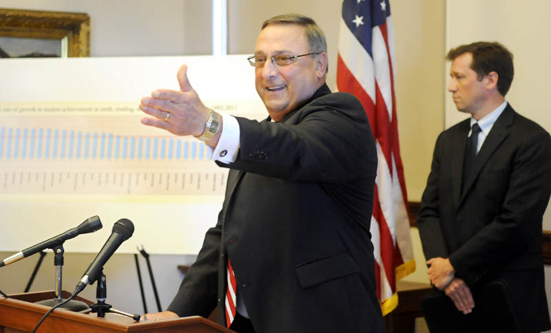 Governor Paul LePage and Commissioner of Education Stephen Bowen, right, reacted to a report by Harvard University's Program on Education Policy and Governance during a press conference last Wednesday in Augusta.