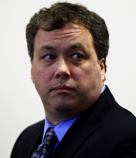 In this May 23, 2011 photo, defendant Mark Kerrigan sits in court during his trial at Middlesex Superior Court, in Woburn, Mass. Kerrigan, brother of Olympic figure skater Nancy Kerrigan, was later convicted of assault and battery in the January 2010 death of their father, Daniel Kerrigan. (AP Photo/Bizuayehu Tesfaye, Pool, File)