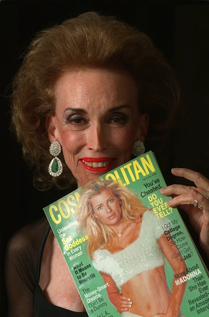 This Jan. 24, 1996 file photo shows Cosmopolitan Editor-in-Chief Helen Gurley Brown holding an issue of the magazine before a Waldorf-Astoria ceremony where she was honored with a Henry Johnson Fisher Award for lifetime achievement in the magazine industry in New York. Brown, longtime editor of Cosmopolitan magazine, died Monday, Aug. 13, 2012 at a hospital in New York after a brief hospitalization. She was 90. (AP Photo/Mark Lennihan, file)