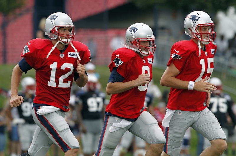 New England Patriots' Tom Brady (12), Brian Hoyer (8) and Ryan Mallett (15) run during NFL football training camp in Foxborough, Mass., Saturday, July 28, 2012. (AP Photo/Michael Dwyer)