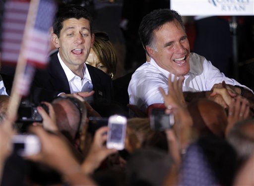 Republican presidential candidate Mitt Romney and vice presidential running mate, Rep. Paul Ryan, R-Wis., left, greet supporters, during a campaign rally in Manassas, Va. recently.