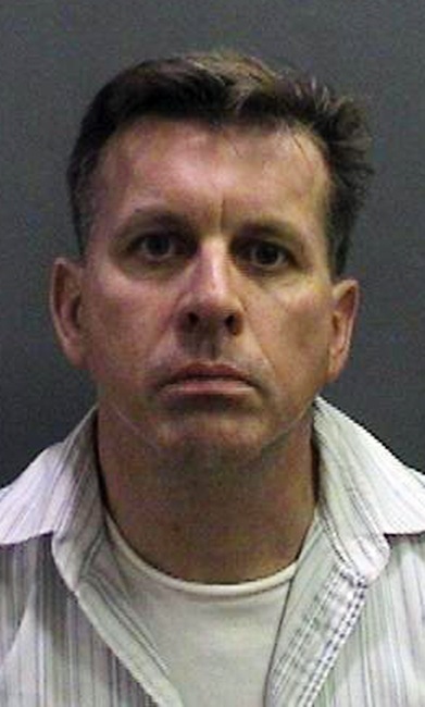 This image provided by the Orange County District Attorney's Office shows a booking photo of Rainer Reinscheid, 48, a professor at the University of California, Irvine, who was arrested July 24, 2012 and charged with numerous felony arson charges. Bail has been denied for a college professor charged with arson for allegedly setting a series of fires at an Orange County high school his son once attended before committing suicide. District attorney's spokeswoman Farrah Emami says a judge ordered Reinscheid held without bail at a hearing Tuesday, and postponed his arraignment until Aug. 8. (AP Photo/Orange County District Attorney's Office)